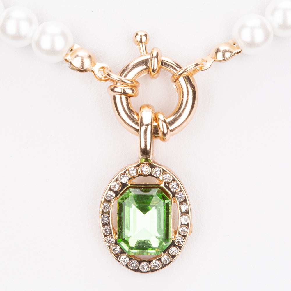 Schmuckgarnitur aus aus goldplattierter Legierung mit rotem Emporia®-Kristall und blauem Emporia®-Kristall