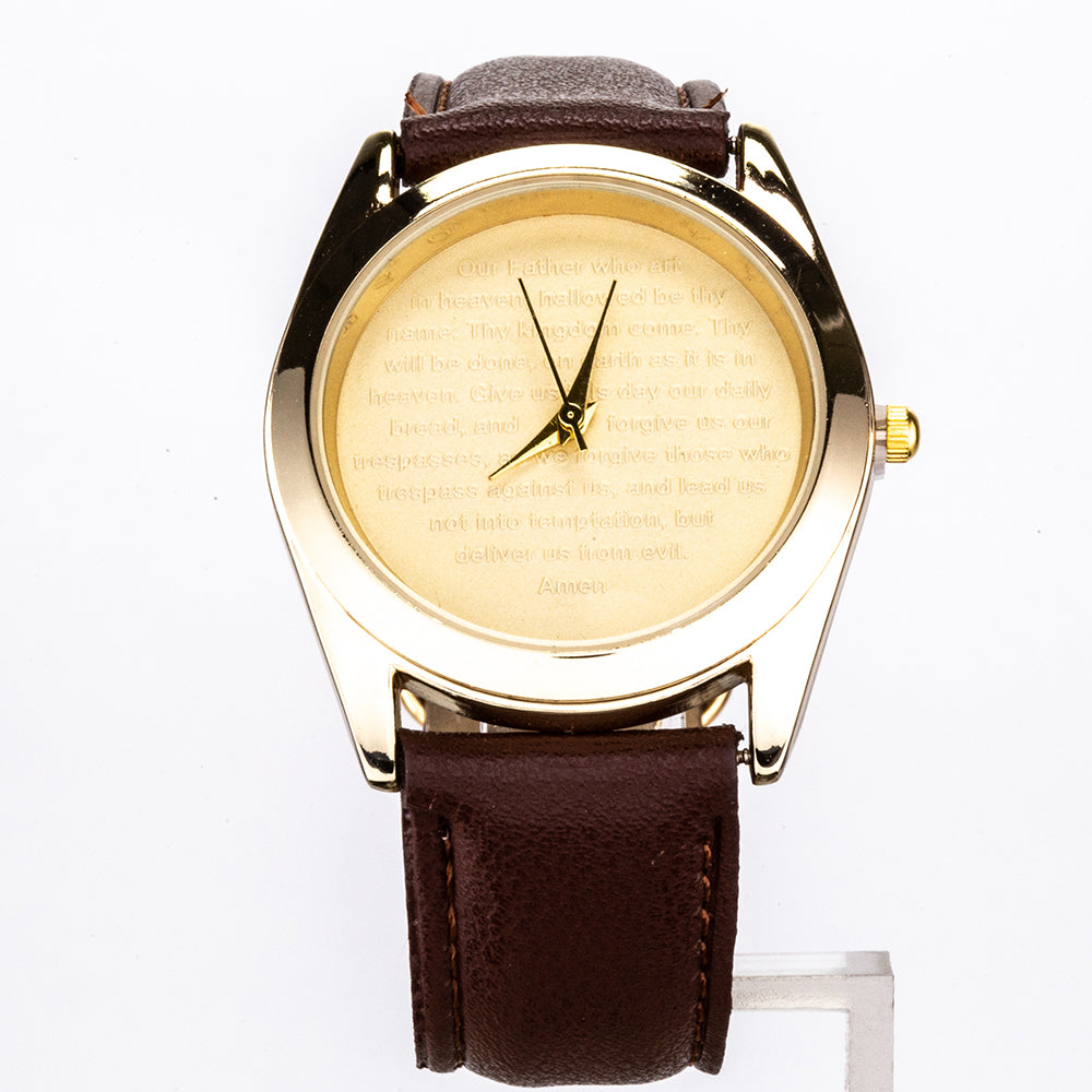 Armbanduhr mit braunem Armband und goldfarbenem Zifferblatt mit einem Gebet