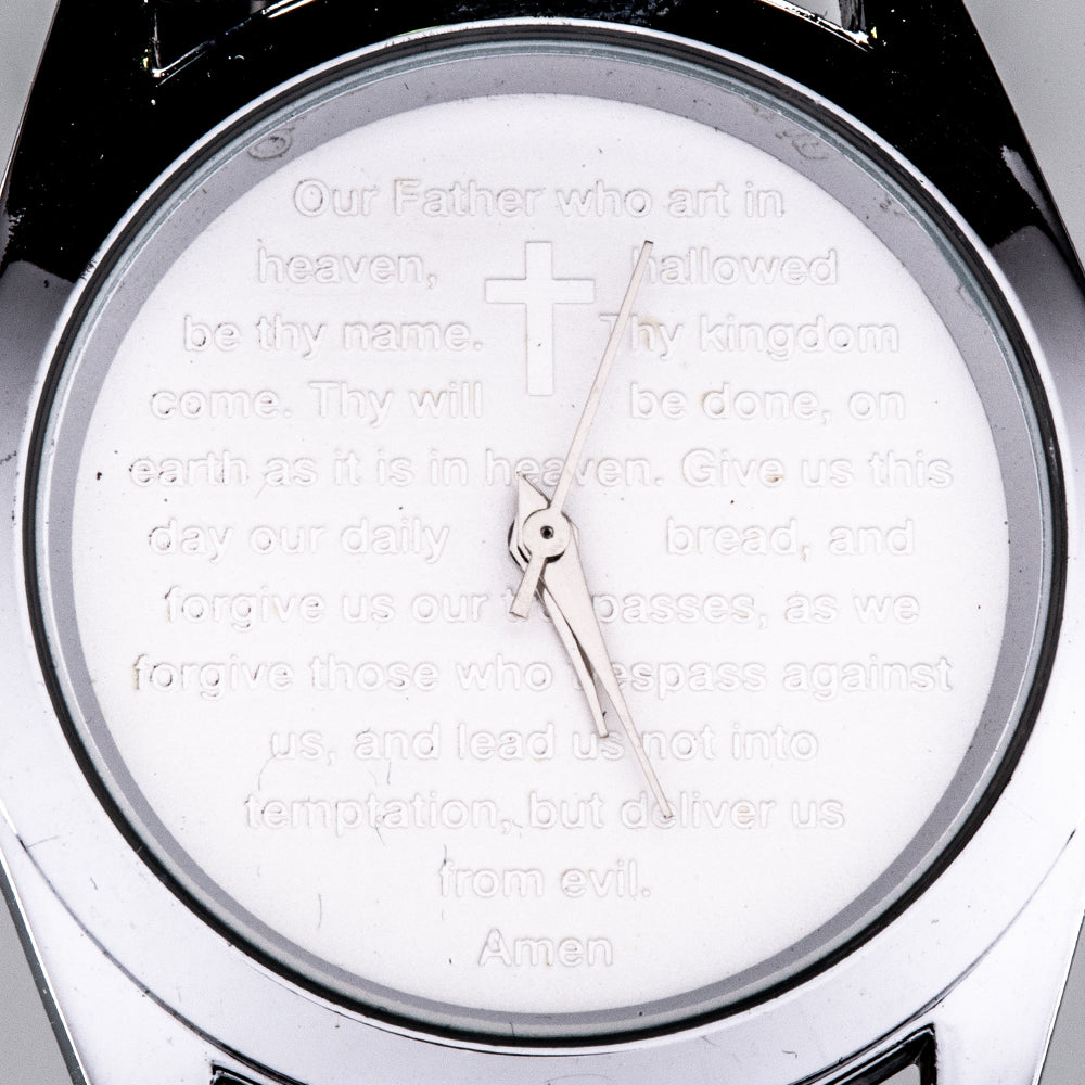 Armbanduhr mit schwarz Armband und weiß Zifferblatt mit einem Gebet