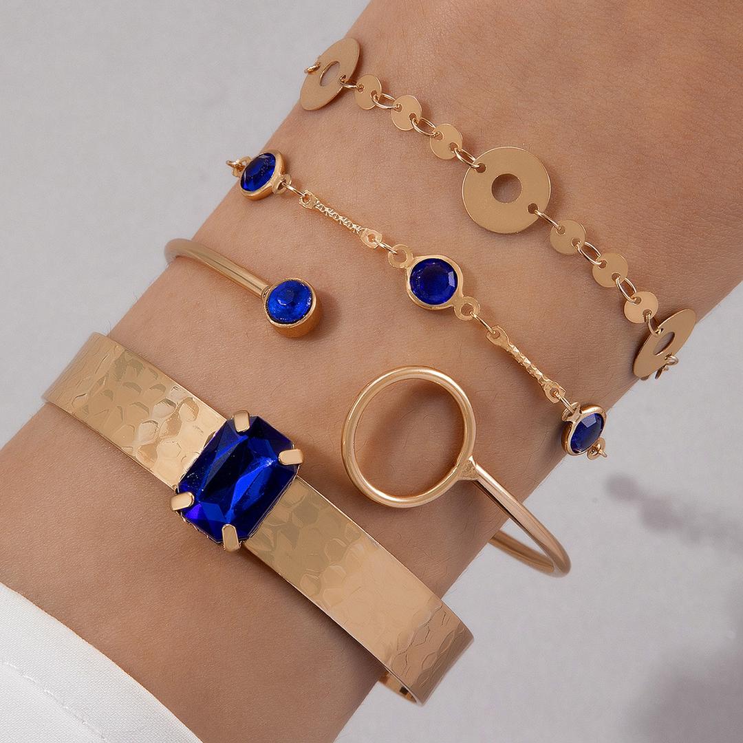Schmuckgarnitur aus aus goldplattierter Legierung mit blauem Emporia®-Kristall