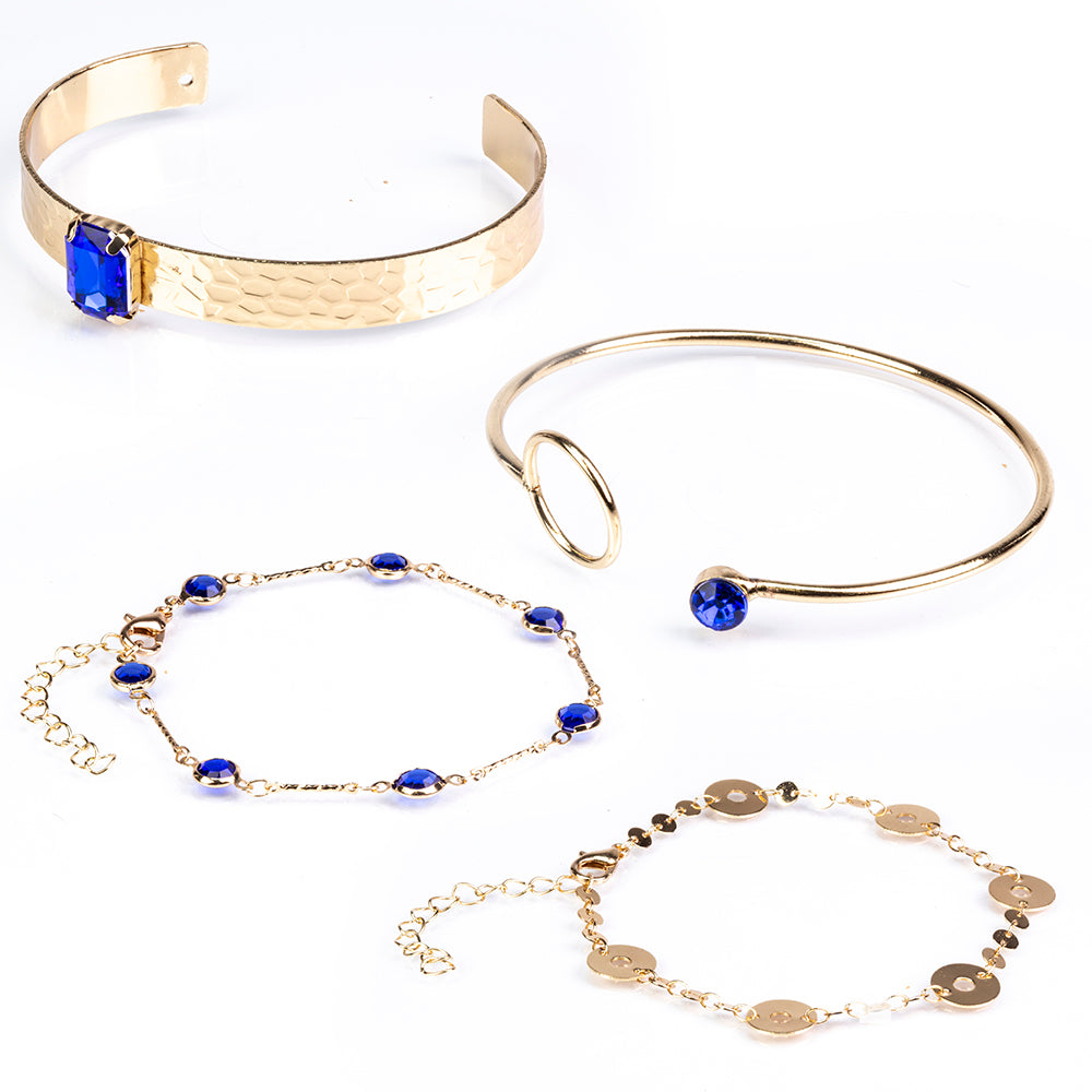 Schmuckgarnitur aus aus goldplattierter Legierung mit blauem Emporia®-Kristall