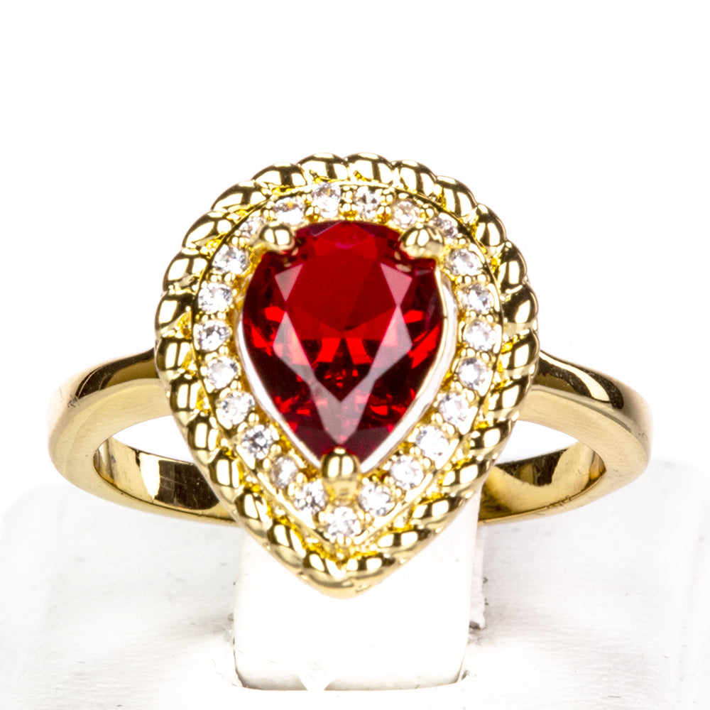 Schmuckgarnitur aus aus goldplattierter Legierung mit rotem Emporia®-Kristall