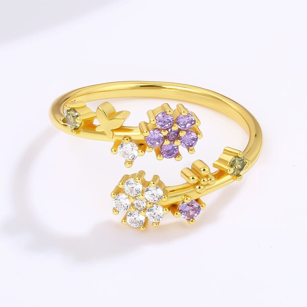 Ring aus goldplattierterr Legierung mit weißem Emporia® Kristall und purpurfarbenem Emporia® Kristall