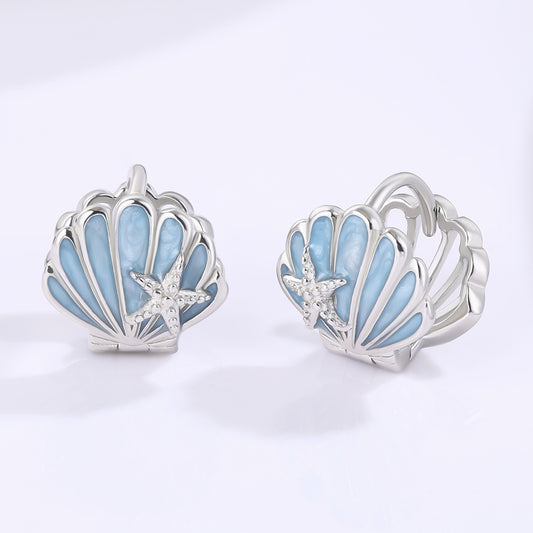 Ohrringe aus goldplattierter Legierung mit blauem Emporia®-Kristall