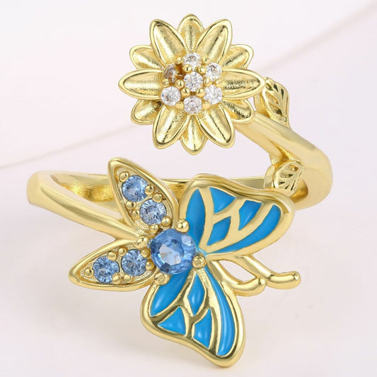 Ring aus goldplattierterr Legierung mit blauem Emporia®-Kristall