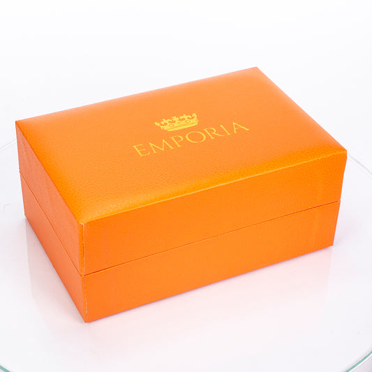 Uhr aus goldplattierter Legierung mit rotem Emporia®-Kristall und weißem Emporia® Kristall