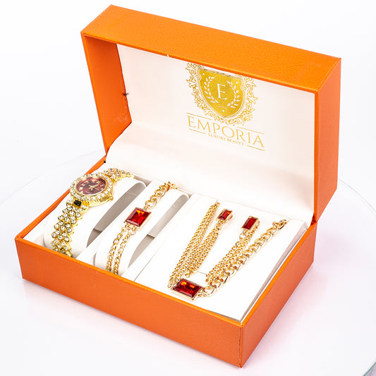 Uhr aus goldplattierter Legierung mit rotem Emporia®-Kristall und weißem Emporia® Kristall