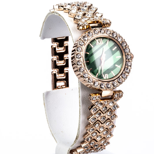 Uhr aus goldplattierter Legierung mit grünem Emporia® Kristall und weißem Emporia® Kristall