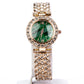 Uhr aus goldplattierter Legierung mit grünem Emporia® Kristall und weißem Emporia® Kristall
