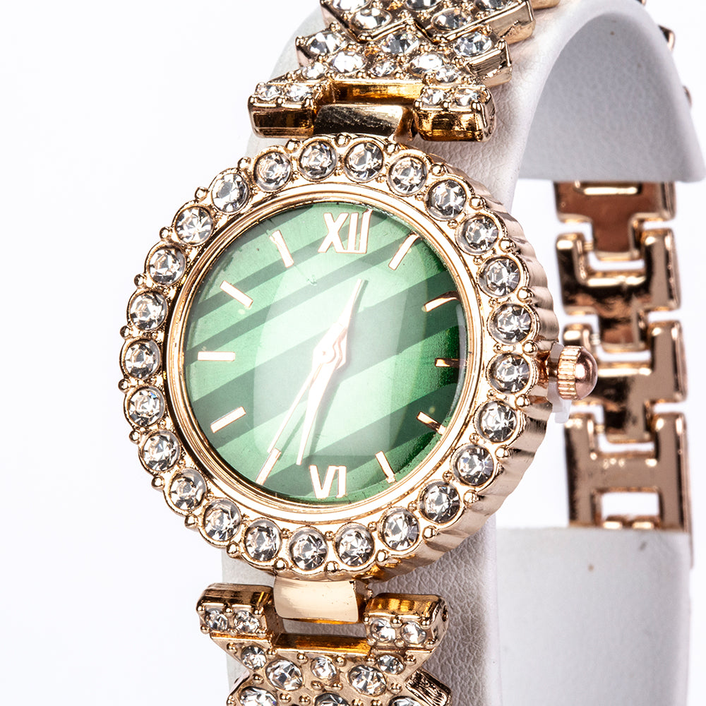 Uhr aus goldplattierter Legierung mit grünem Emporia® Kristall und weißem Emporia® Kristall