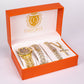 4-teiliges, goldfarbenes Emporia Schmuckset in Premium-Qualität, in einer exklusiven Geschenkbox in Lederoptik (mit Uhr, Armband, breiter Halskette und einer Halskette mit Kreuzanhänger und weißem Emporia-Kristall)