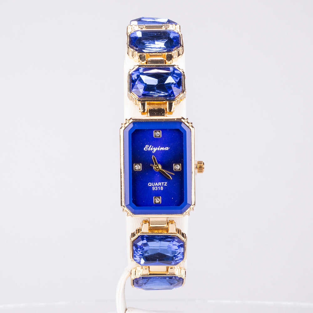 Uhr aus goldplattierter Legierung mit blauem Emporia®-Kristall