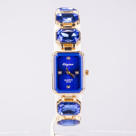 Uhr aus goldplattierter Legierung mit blauem Emporia®-Kristall