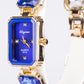 Uhr aus goldplattierter Legierung mit blauem Emporia®-Kristall