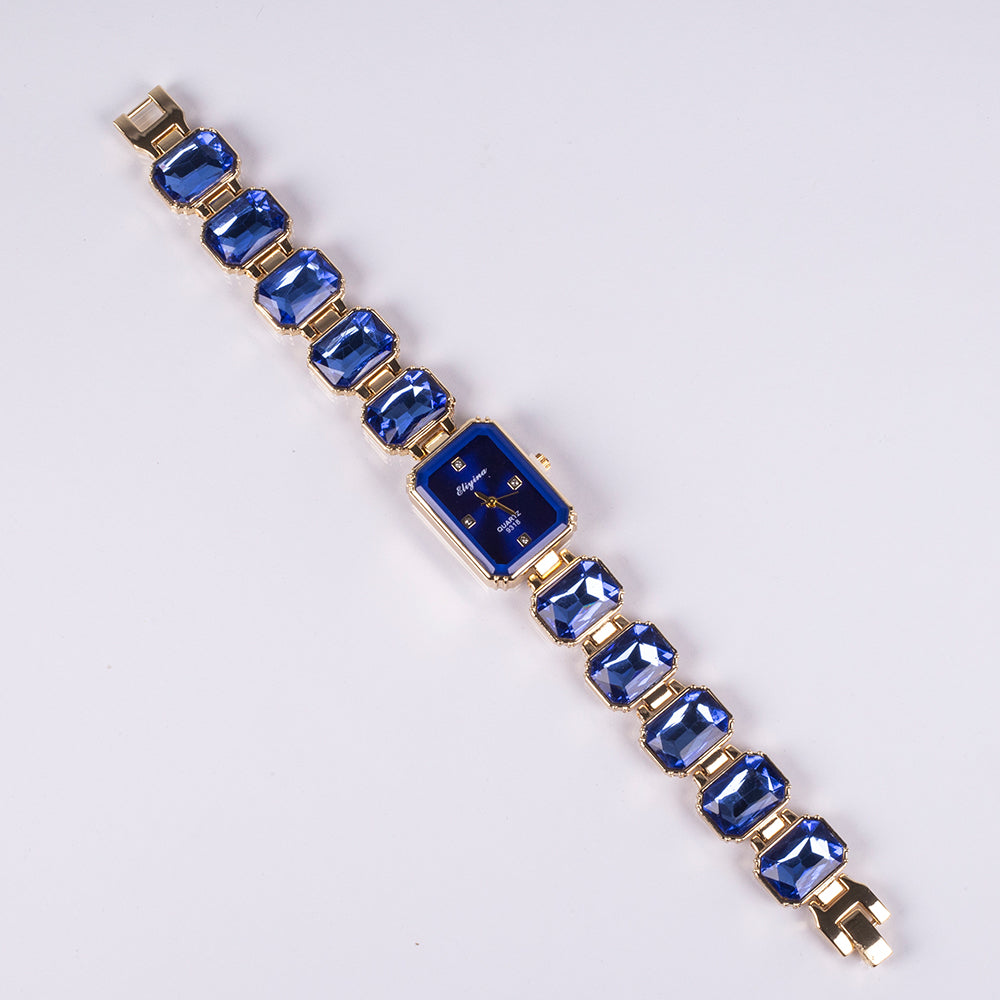 Uhr aus goldplattierter Legierung mit blauem Emporia®-Kristall 5 