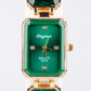 Uhr aus goldplattierter Legierung mit grünem Emporia® Kristall