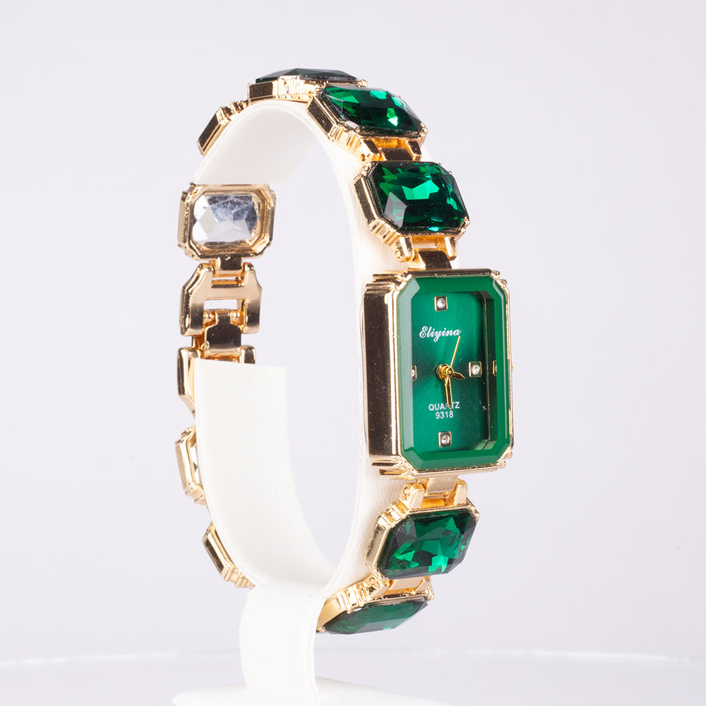 Uhr aus goldplattierter Legierung mit grünem Emporia® Kristall 1 