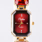 Uhr aus goldplattierter Legierung mit rotem Emporia®-Kristall
