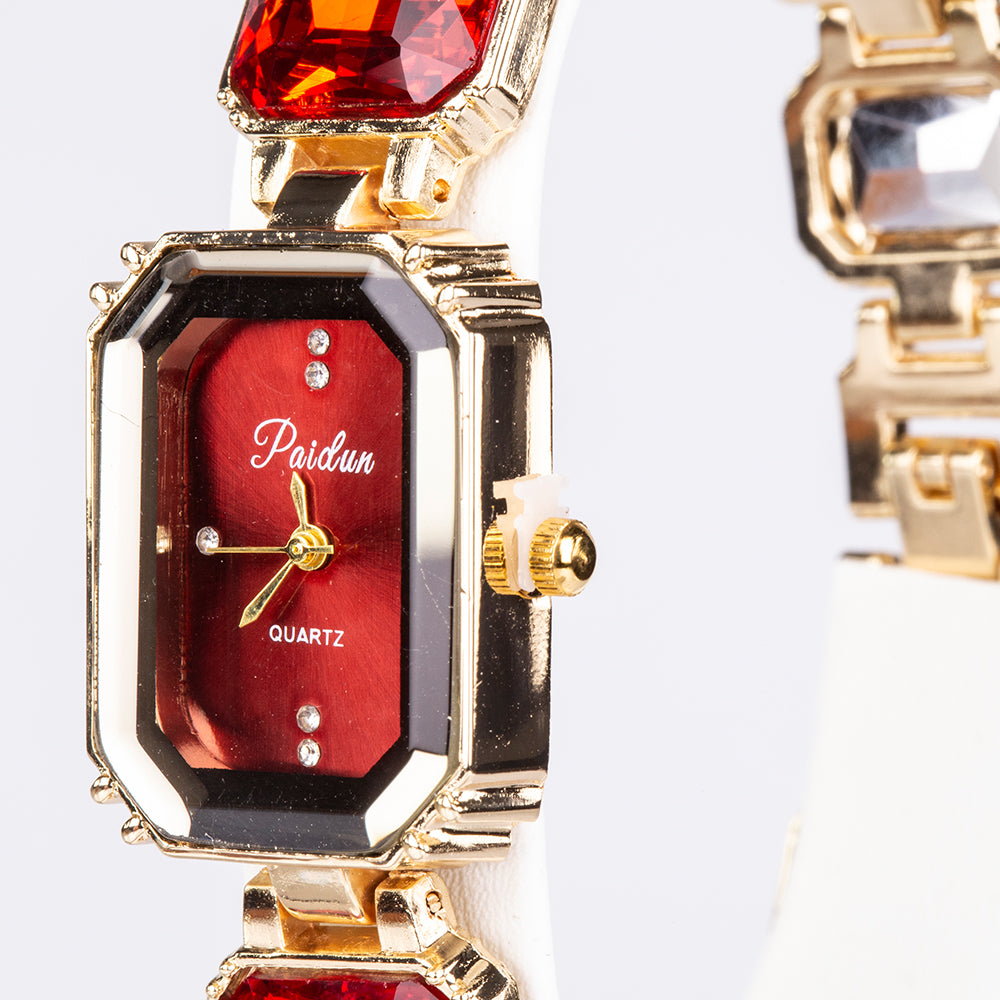 Uhr aus goldplattierter Legierung mit rotem Emporia®-Kristall 3 