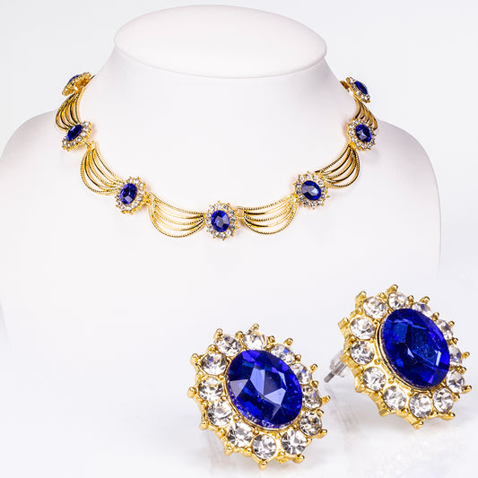 Schmuckgarnitur aus aus goldplattierter Legierung mit blauem Emporia®-Kristall und weißem Emporia® Kristall