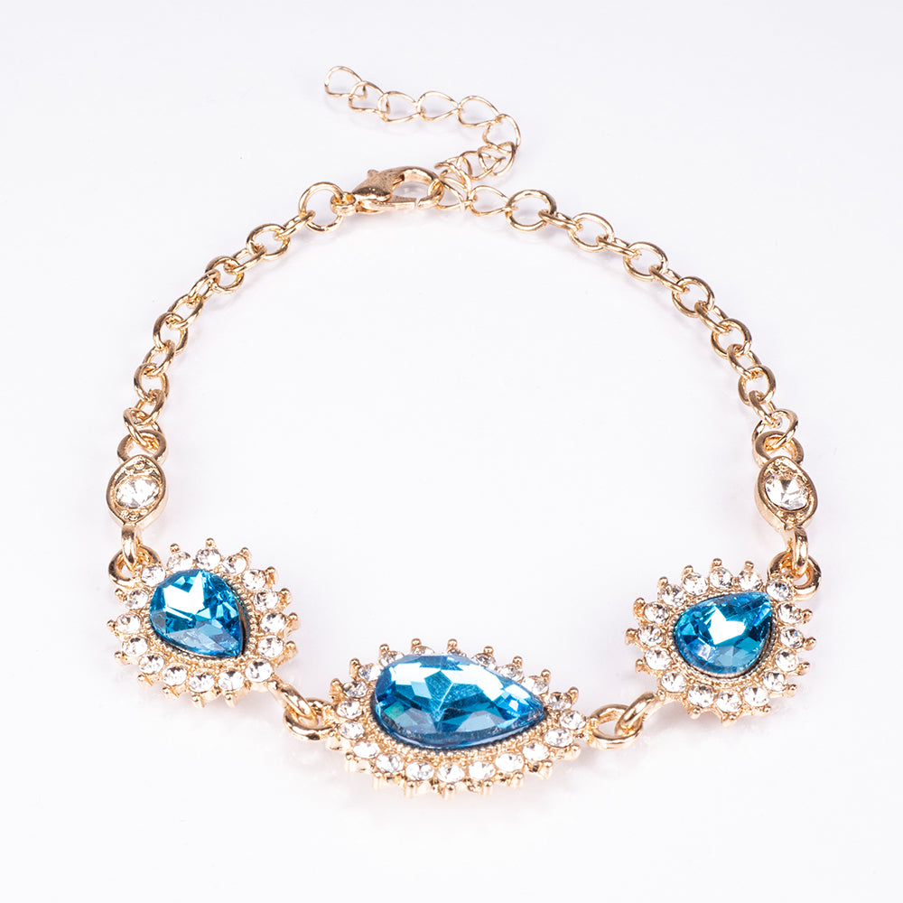 Schmuckgarnitur aus aus goldplattierter Legierung mit blauem Emporia®-Kristall und weißem Emporia® Kristall 5 