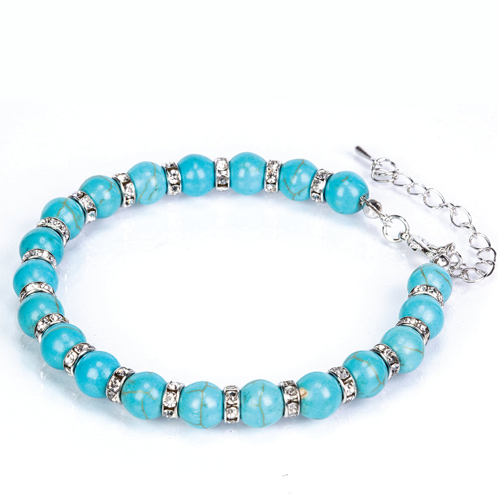 Schmuckgarnitur aus aus goldplattierter Legierung mit Türkis