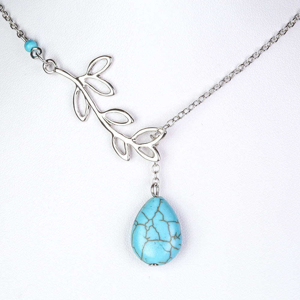 Schmuckgarnitur aus aus goldplattierter Legierung mit Türkis