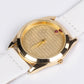 Uhr aus goldplattierter Legierung mit Rubin
