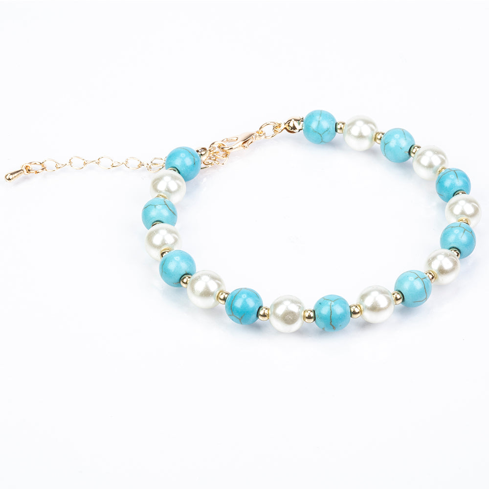 Schmuckgarnitur aus aus goldplattierter Legierung mit Türkis