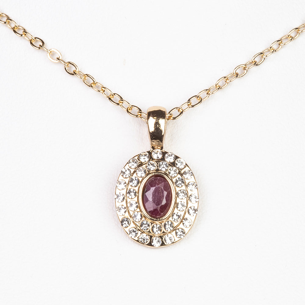 Schmuckgarnitur aus aus goldplattierter Legierung mit Rubin und weißem Emporia® Kristall 7 