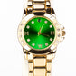 Uhr aus goldplattierter Legierung mit Smaragd und weißem Emporia® Kristall