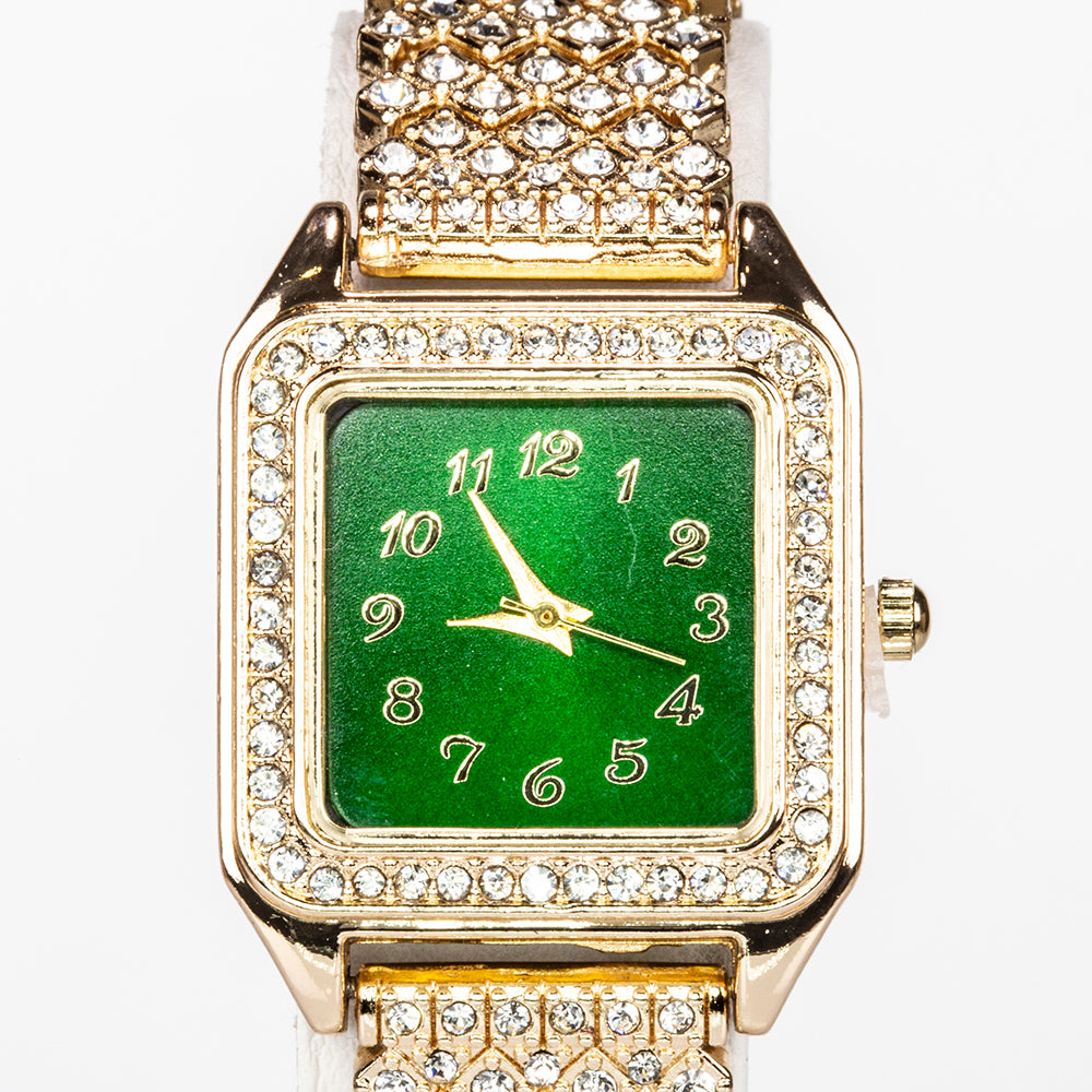 Uhr aus goldplattierter Legierung mit grünem Emporia® Kristall und weißem Emporia® Kristall