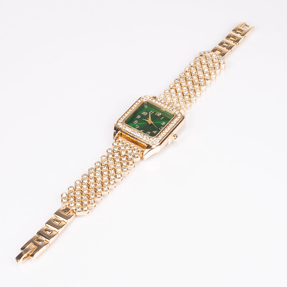 Uhr aus goldplattierter Legierung mit grünem Emporia® Kristall und weißem Emporia® Kristall
