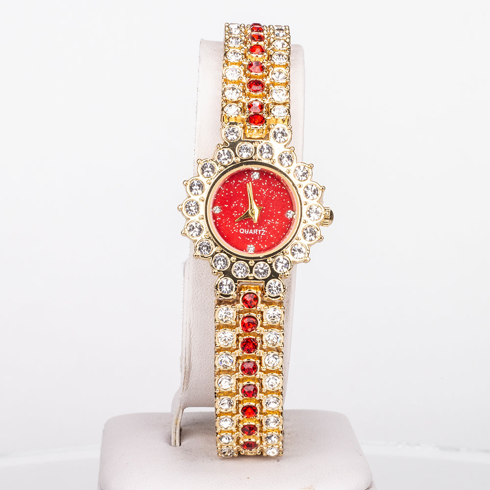 Uhr aus goldplattierter Legierung mit rotem Emporia®-Kristall