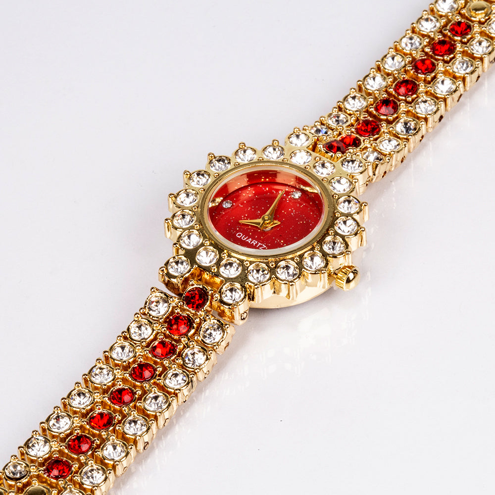 Uhr aus goldplattierter Legierung mit rotem Emporia®-Kristall