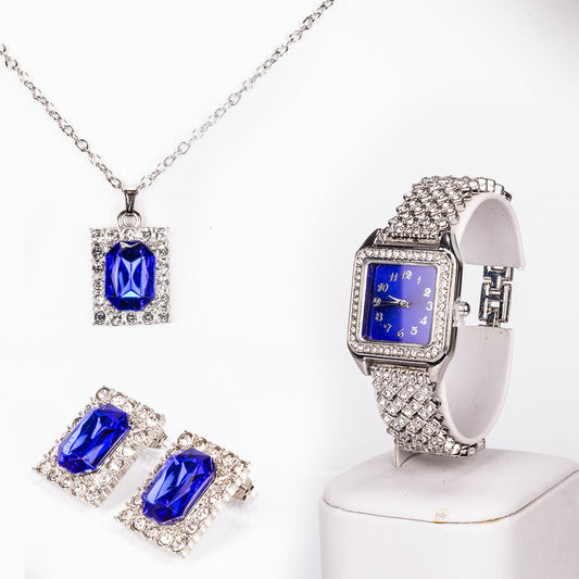 Uhr aus goldplattierter Legierung mit blauem Emporia®-Kristall und weißem Emporia® Kristall