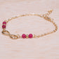 Armband aus goldplattiertesr Legierung mit Rubin
