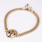 Armband aus goldplattiertesr Legierung mit Rubin und Saphir