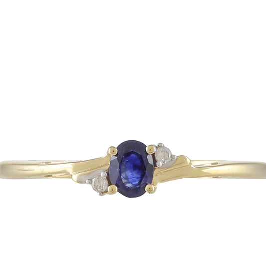 Goldring mit blauem Saphir und weißem Diamant