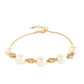 Goldplattiertes Silberarmband mit barocker Süßwasserzuchtperle und weißem Topas