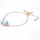 Goldplattiertes Silberarmband mit Larimar und natürlichem Zirkon