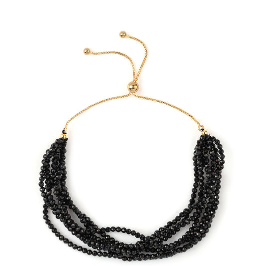Goldplattiertes Silberarmband mit schwarzem Spinell