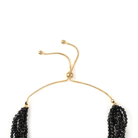 Goldplattiertes Silberarmband mit schwarzem Spinell