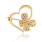 Goldplattierte Silberbrosche mit blauem Diamant
