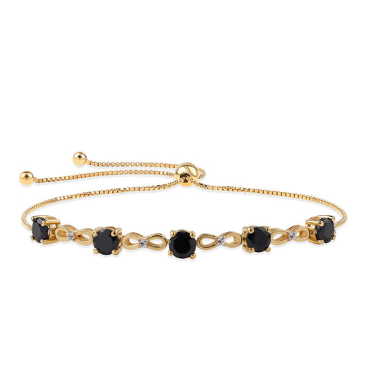 Goldplattiertes Silberarmband mit schwarzem Spinell und weißem Topas