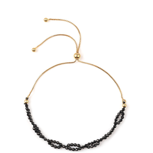 Goldplattiertes Silberarmband mit schwarzem Spinell