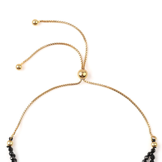 Goldplattiertes Silberarmband mit schwarzem Spinell