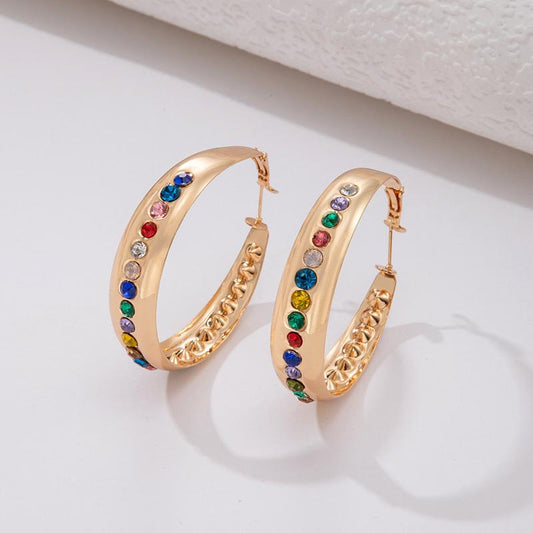 Ohrringe aus goldplattierter Legierung mit rotem Emporia®-Kristall und blauem Emporia®-Kristall