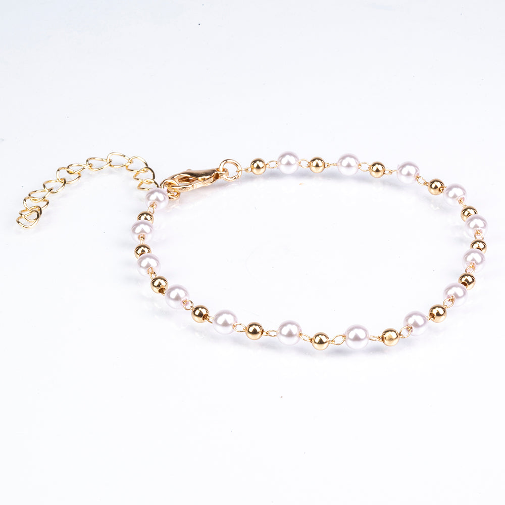 Schmuckgarnitur aus aus goldplattierter Legierung mit Glasperle und weißem Emporia® Kristall 5 