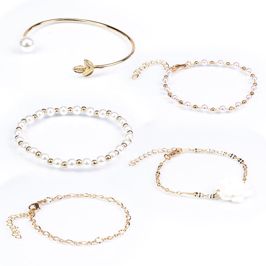 Schmuckgarnitur aus aus goldplattierter Legierung mit Glasperle und weißem Emporia® Kristall